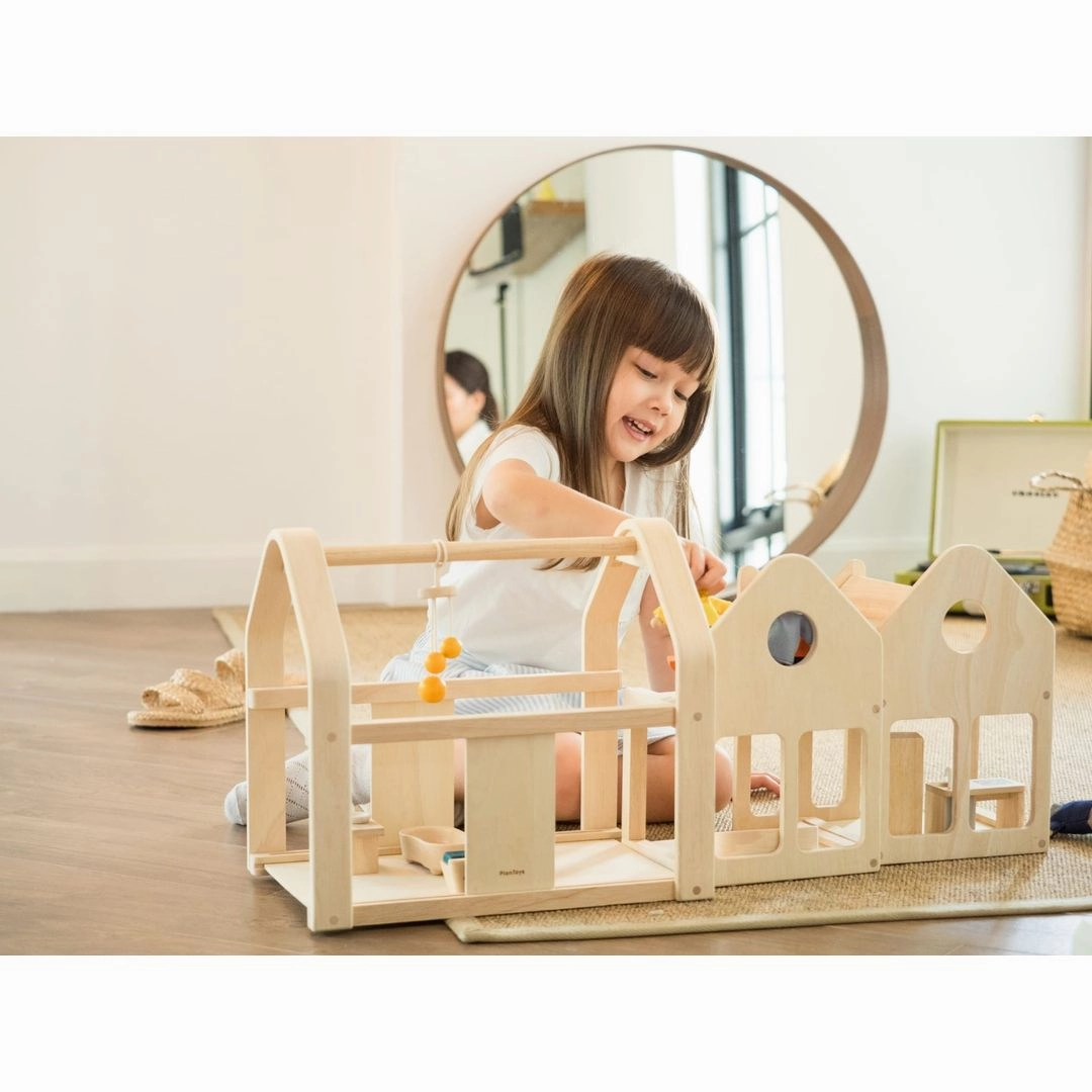 Learning tools Nurturing minds Slide-N-Go Dollhouse
