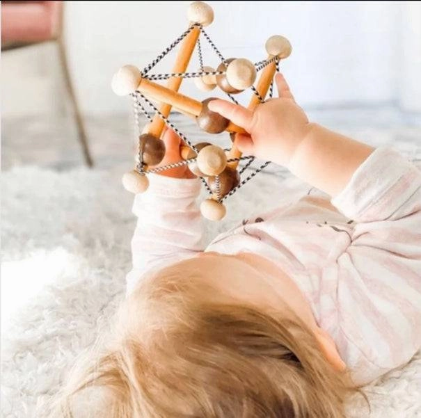 Skwish Wooden Baby Rattle & Teething Toy Active learners Inspiring creativity